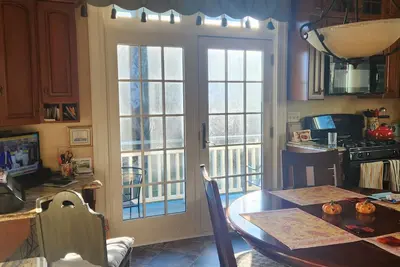 Image de 2-bedroom condo in lovely Salem with WiFi, Ac, right next to a private beach.