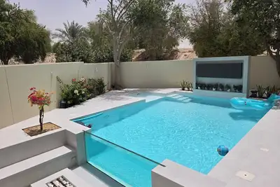 Image de Charming 3-bedroom villa with amazing pool, outdoor screen and fire pit