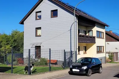 Image de The modern vacation apartment is situated in a quiet location next to the local recreation area