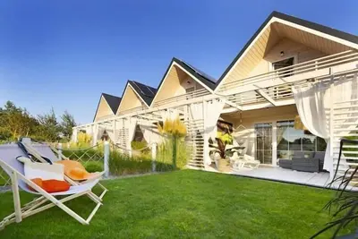Image de Maison à Kopań près de la plage avec piscine