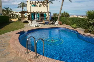 Image de Villa Palomares on the beachfront right on the beach