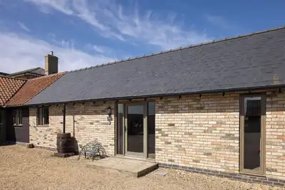 Image de Stylish cottage, courtyard view, wood burning hot tub, 20 mins to Cambridge