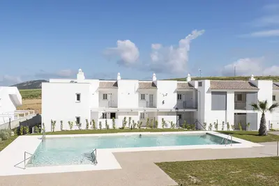 Image de Atlanterra Sunset Home - Modern flat with shared pool only 10 minutes from the beach and w