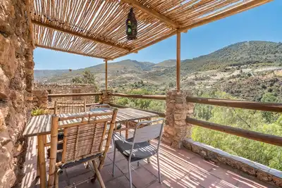Image de Appartement 'Lola' avec vue sur la montagne, terrasse privée et Wi-Fi