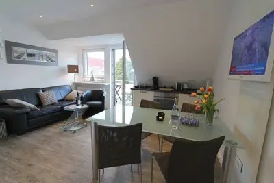 Image de Modern furnished vacation apartment on 2 levels in the heart of Wenningstedt