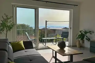 Image de Modern apartment with roof terrace / balcony. Panoramic view of the sea.