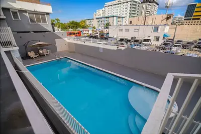 Image de 2-bedroom condo in charming Carolina with WiFi, Ac. 4 min walk to beach!