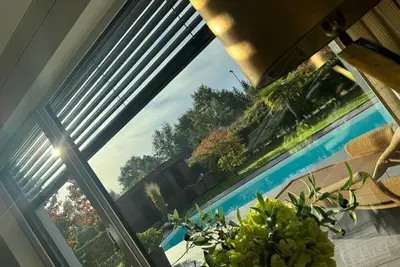 Image de Luxueuse location Schaffner avec piscine privée, sauna, jacuzzi, terrasse et Wi-Fi