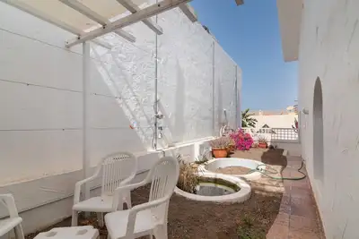 Appartement de vacances 'Apartamento Con Jardín' avec vue sur les montagnes, jardin privé et Wi-Fi
