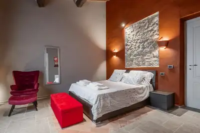 Image de Appartement 'Il Rifugio Illuminato - Brunello' avec jardin partagé, Wi-Fi et climatisation
