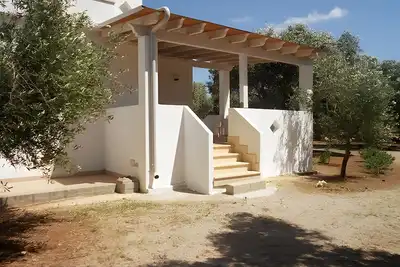 Image de Villa 'Terra Rossa - Piccola' avec terrasse privée, jardin privé et climatisation