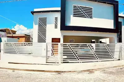 Image de New 3-bedroom house - WiFi and Ac  Residencial Romana Del Oeste - close to beach
