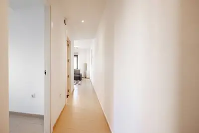 Image de Bright Apartment with Wraparound L-Shaped Balcony