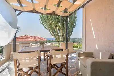 Image de Appartement 'Eirini - One-Bedroom' avec vue sur mer, Wi-Fi et climatisation