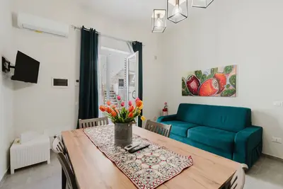 Image de Appartement 'Lazzara 19 - Home 01' avec balcon, Wi-Fi et climatisation