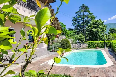 Image de Joli appartement pour 4 personnes avec Wifi, piscine privée, Tv, patio, vue panoramique et parking
