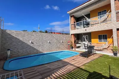 Image de Refúgio prox mar com churrasq, piscina e Wi-Fi