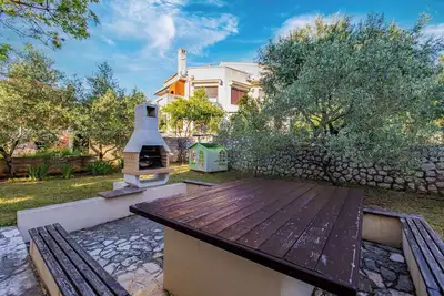 Image de Appartement de vacances avec une grande terrasse