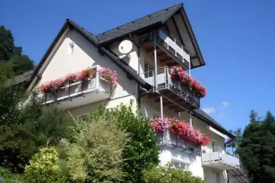 Image de Appartement 'Am Keschtewäldele' avec vue sur les montagnes, terrasse privée et Wi-Fi
