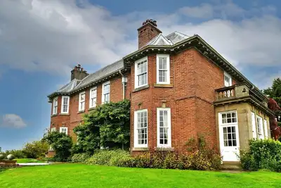 Image de Maison de campagne de 9 chambres א Longtown, Sans dיpפt