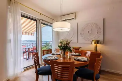 Image de Appartement de vacances avec vue sur la mer et climatisation