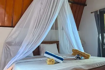 Image de Peaceful 2br Bungalow • Pool Access • Walk to Sunset Beach