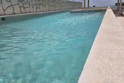 Image de Brand New 2-bedroom 2-Bath. Rooftop Pool. 5 min walk to beach. Private parking.