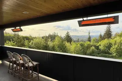 Image de sweeping views, open living, large heated covered deck, marina community w/ slip