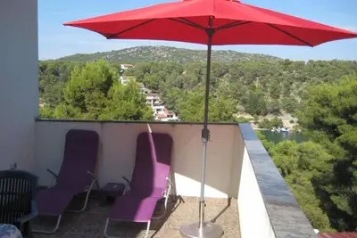 Image de Appartement d'une chambre avec le balcon et la vue sur le mer Zaton, Krka (A-24448-a)