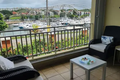 Image de One level large villa apartment offering waterfront, and marina views.