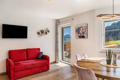 Image de Appartement 'Bienenwiese' avec vue sur les montagnes, terrasse partagée et Wi-Fi