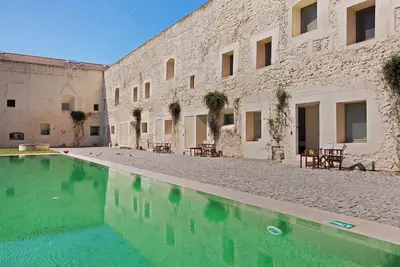 Image de Appartement 'Architect Luxury Ancient Triplex' avec piscine partagée, Wi-Fi et climatisation