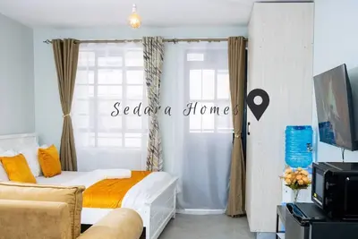 Executive studio along Waiyaki Way, with wifi, swimming pool & access to stores.