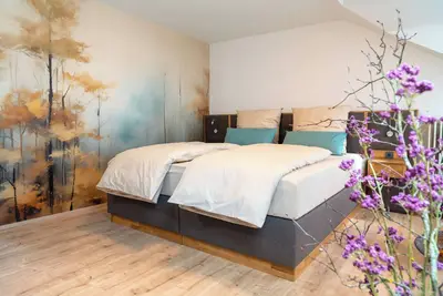 Image de Central, quiet location directly in the hiking area. Bettstod - da legenst di nieder.