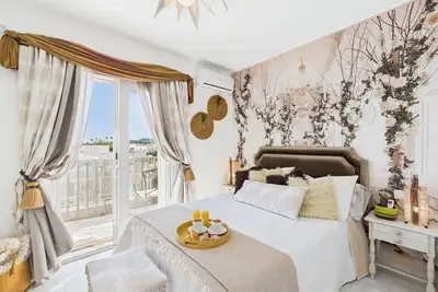 Image de Elegant 2-bedroom townhouse with air conditioning and community pool