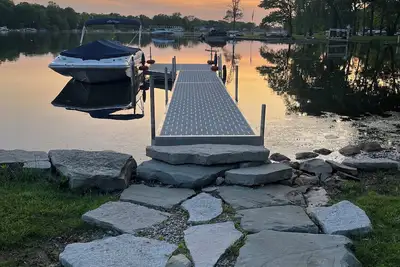 Image de Cozy Lake Escape with Dock, Firepit, & Fenced Yard