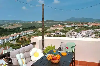 Image de Charming penthouse ideal for couples. Overlooking the sea (800m. ) and the mountains.