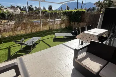Image de Appartement Aguamar, rez-de-chaussée, 1 pièce, jardin et piscine.