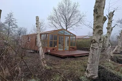 Image de Maison à Friesland avec Véranda Lumineuse