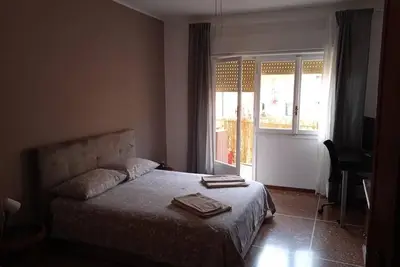 Image de Cozy apartment 10 minutes from Metro Tiburtina and bus stop 50m away.