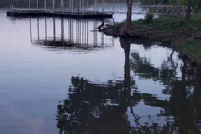 Image de Charming 2-bedroom lake house with boat dock in tranquil setting in Okmulgee