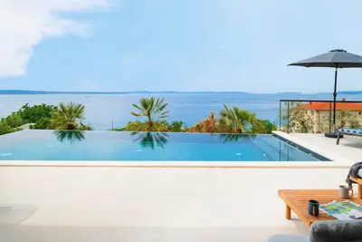 Image de **Chic Villa Masha with Private Heated Pool, Spa, Whirlpool and SeaViews**
