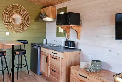 Image de Roulotte Esmeralda avec Spa