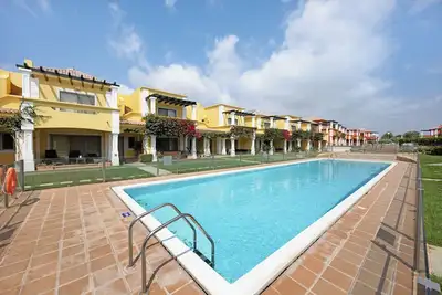 Image de Maison de vacances 'Alecrim Lux Tavira Residence 4m' avec piscine partagée, Wi-Fi et climatisation