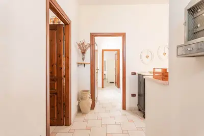 Image de Maison de vacances 'La Casa Rosa Di Rita E Franco' avec balcon et Wi-Fi