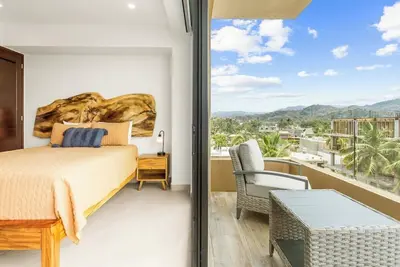 Image de Tranquil Jungle and Ocean View Penthouse with Pool and Hot Tub