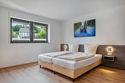 Image de Chambre 'Am Schluchtensteig' avec jardin partagé et Wi-Fi
