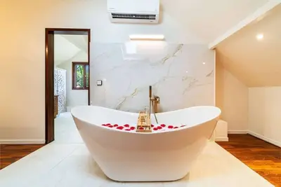 Image de Villa Du Jardin Angelique classée 5 étoiles - 4 suites - piscine CHAUFFÉE située en plein centre-ville de St Pierre à 2 pas du lagon