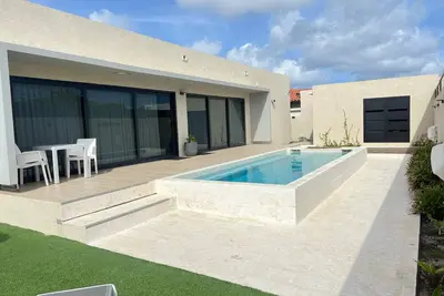 Image de New 3br Villa in amazing Noord + Pool + Fully Ac