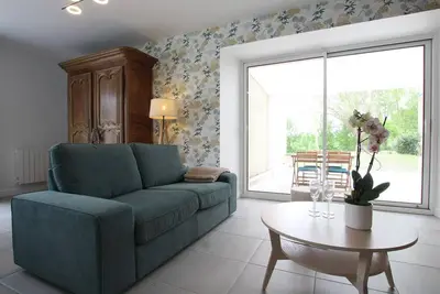 Image de Gîte charmant à Portbail, jardin commun et terrasse privée